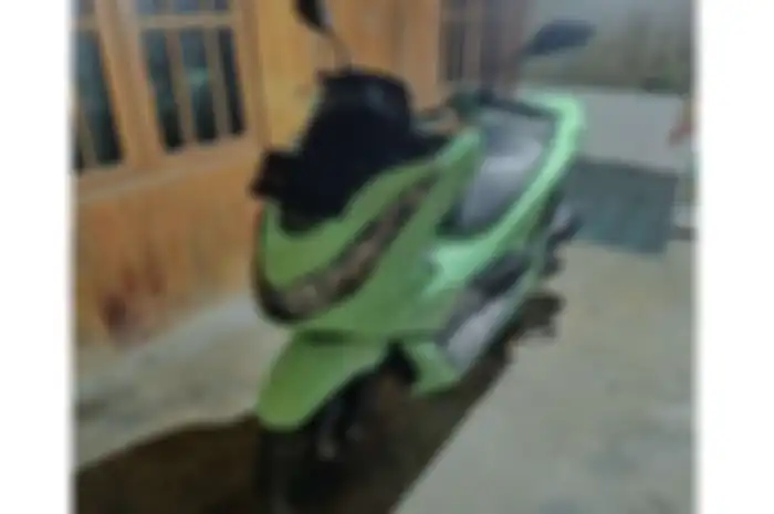 Modifikasi motor pakai skotlet warna hijau sage.