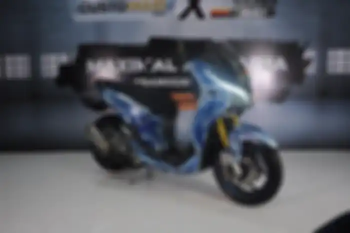 Bodi tema kartun, modifikasi motor Yamaha Lexi sebelumnya disketsa pakai spidol dari Jepang.