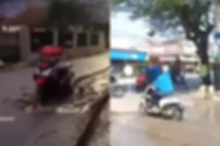 Pemuda naik Honda Vario lewati jalan dicor di Bandung.Emak-emak Honda Scoopy gak mau kalah, malah lebih cuek.