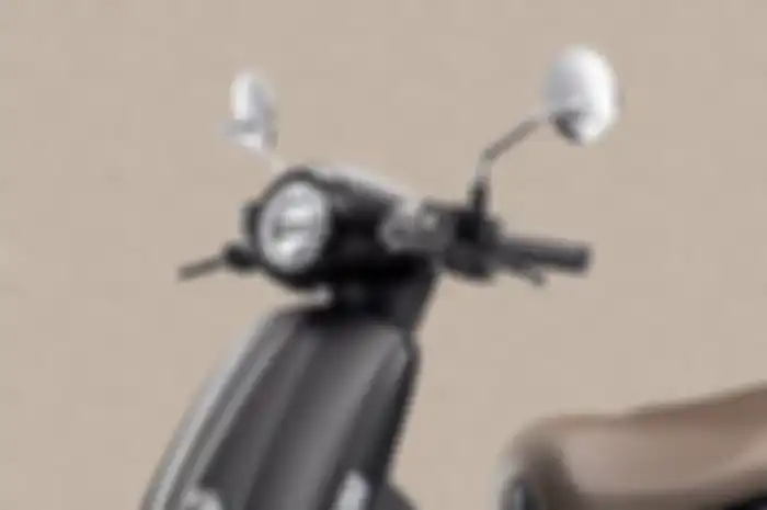Headlamp Kymco Many LED 125 berbentuk bulat.