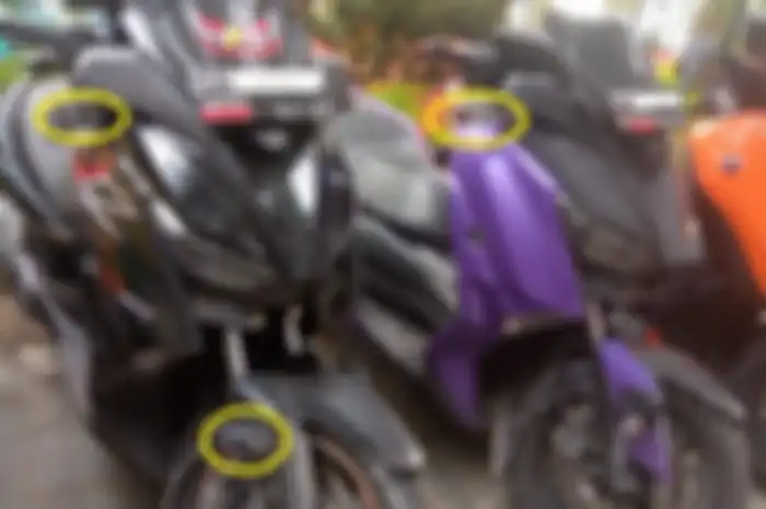 Motor member Squad Max Community Indonesia (SMCI) Pekanbaru pasang lampu tembak untuk keselamatan berkendara.