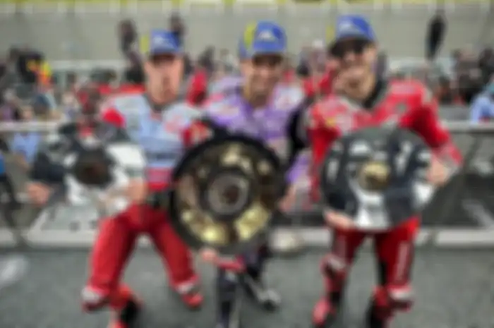 Podium Race MotoGP Australia 2023, Johann Zarco pertama (tengah), Francesco Bagnaia kedua (kanan), dan Fabio Di Giannatonio ketiga (kiri).
