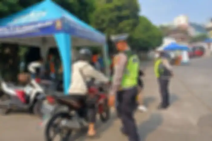 Foto ilustrasi pemeriksaan. Mulai besok razia uji emisi di Jakarta denda Rp 250 ribu untuk motor.