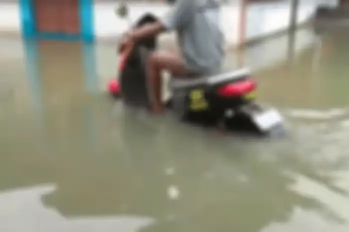Ilustrasi motor listrik terobos banjir.