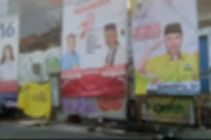 (Ilustrasi). Baliho kampanye dirasa mengganggu, pengendara motor dan mobil bisa lapor ke Polisi. (Gambar: Kompas.tv/Iman Firdaus)