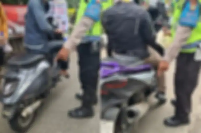 Polisi tindak motor knalpot aftermarket atau biasa disebut knalpot brong di Jakarta Timur, Rabu (18/1/2023).