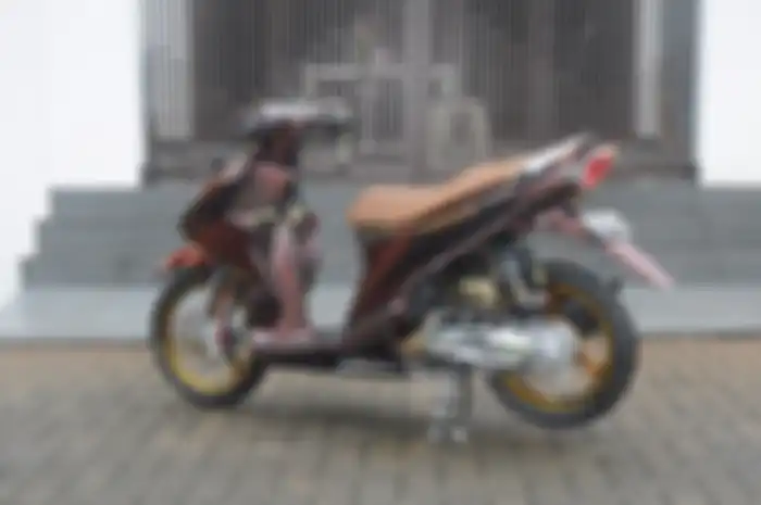 Modifikasi motor Suzuki Nex II berbodi bunglon.