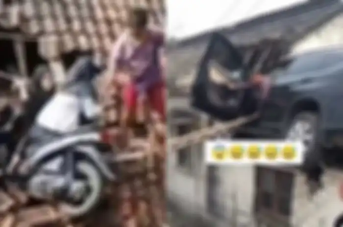 Bikin ngakak setelah pemotor Honda Vario nyangkut di genteng rumah warga kini giliran mobil Honda CRV yang parkir di atap.