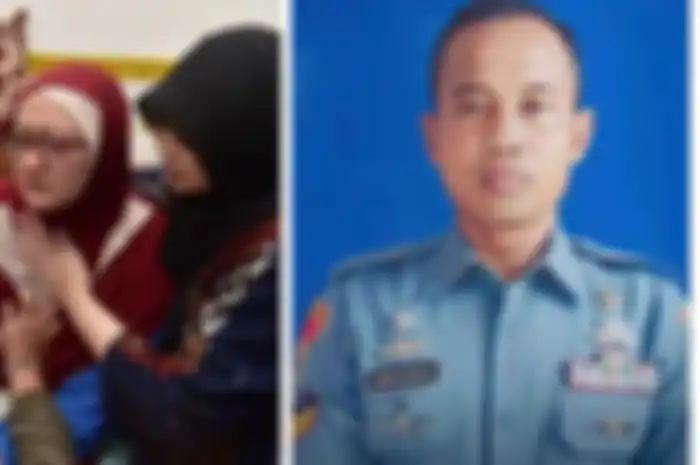 Komandan Korps Marinir (Dankormar) TNI AL Mayjen Endi Supardi melayat ke kediaman Ismunandar di Cilandak, Jakarta Selatan, pada Minggu (17/3/2024). Tamak istri Sertu Mar Ismunandar menangis kesedihan. 