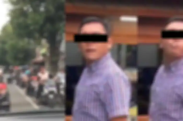 Seorang pria meludah saat ditegur karena parkir mobilnya sembarangan.