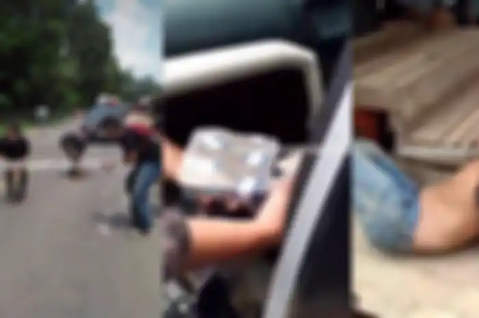 Perampok bermotor jatuh di jalan uang ratusan juta berhamburan di Jambi