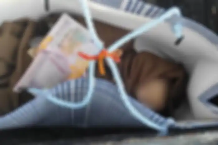 Penemuan mayat bayi dalam bak mobil pick up di Padangsambian Klod, Denpasar, Bali.