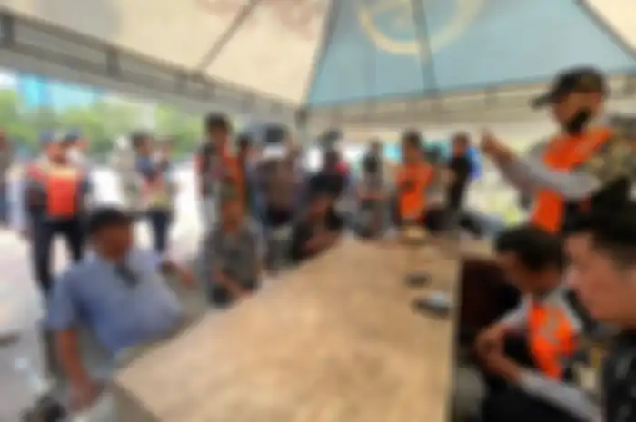 Sejumlah tukang parkir liar yang didata Dishub DKI usai ditangkap karena penjaringan. 