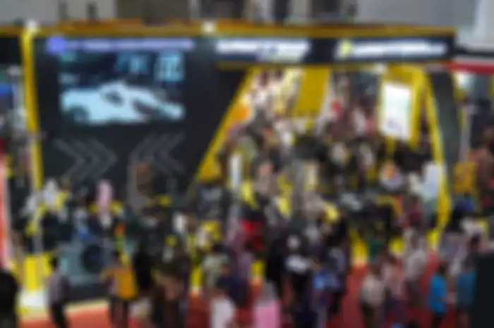 Booth motor listrik United E-Motor di Jakarta Fair Kemayoran 2024.