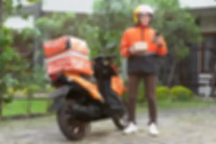 Ilustrasi driver ojol Lalamove Ride.