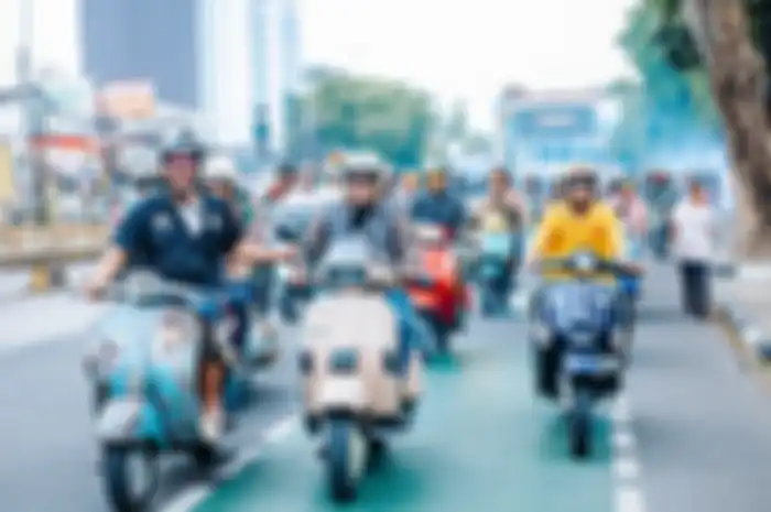 Riding komunitas Vespa di event Batik Nation Ride 2024, Minggu (13/10/2024).