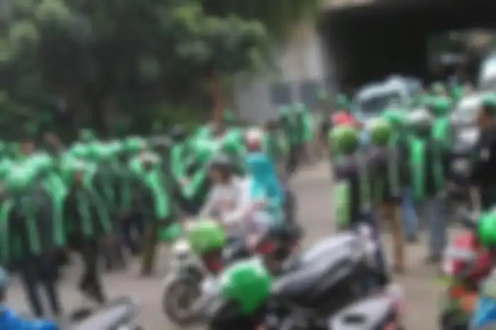 Ilustrasi pengendara ojek online.