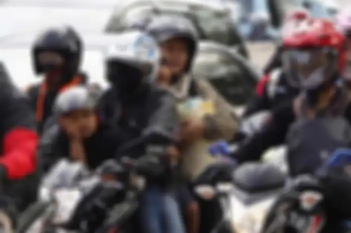 Ilustrasi mudik menggunakan motor. Polisi Paksa 29.077 Pemotor yang Mudik Untuk Putar Balik
