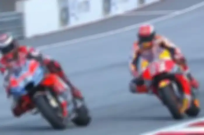 Jorge Lorenzo dan Marc Marquez saat berduel di MotoGP Austria.