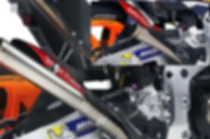 Perubahan panjang knalpot yang sejajar tinggi ban, bikin Honda RC213V menurut Marc Marquez beda banget. 
