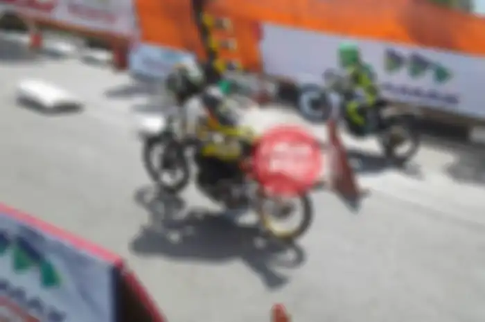 Catatan waktu Dwi di penyisihan Pertamax Drag Bike 201M Championship kelas Sport 2-tak Tune up 140 cc diraihnya 7,266 detik