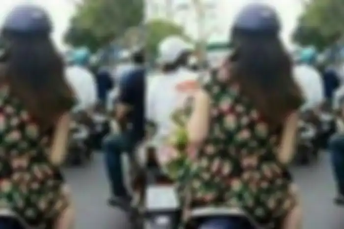 Memang, faktanya foto wanita sedang naik motor lengkap dengan helm di kepalanya mendadak viral di media sosial