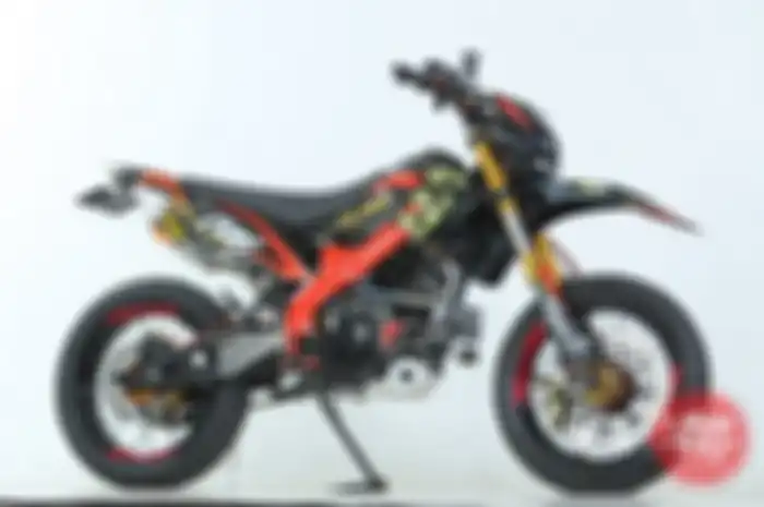 Niatannya dijadikan kenyataan dalam modif Kawasaki D-Tracker 150 (DT) miliknya. 