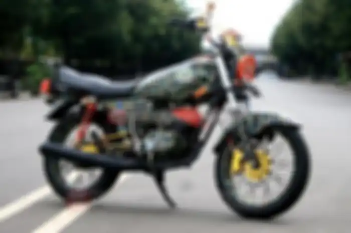 Kompol Eko sedang berbunga karena bisa mewujudkan hobi yang lama tertunda. Sejak awal tahun 90-an, doi udah kesengsem tampang Yamaha RX-King yang legendaris.