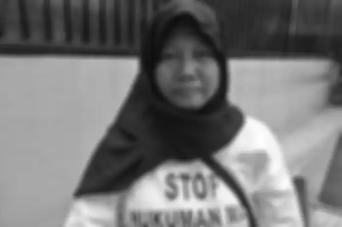 Siti Badriah, wanita paruh baya yang menjadi orator aksi protes komunitas Migrant Care terhadap hukuman mati yang diterima pekerja migran asal Majalengka, Jawa Barat, Tuti Tursilawati, Jumat (2/11/2018) 