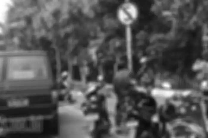 Ilustrasi rambu lalu lintas dilarang berhenti