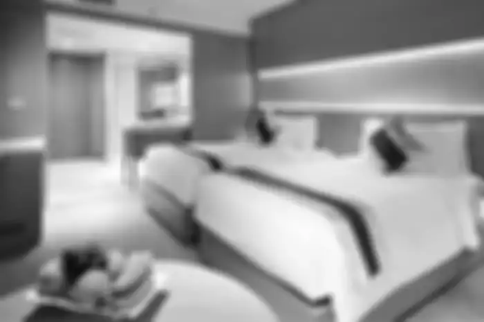 Ilustrasi kamar hotel dengan tipe kasur twin bed.