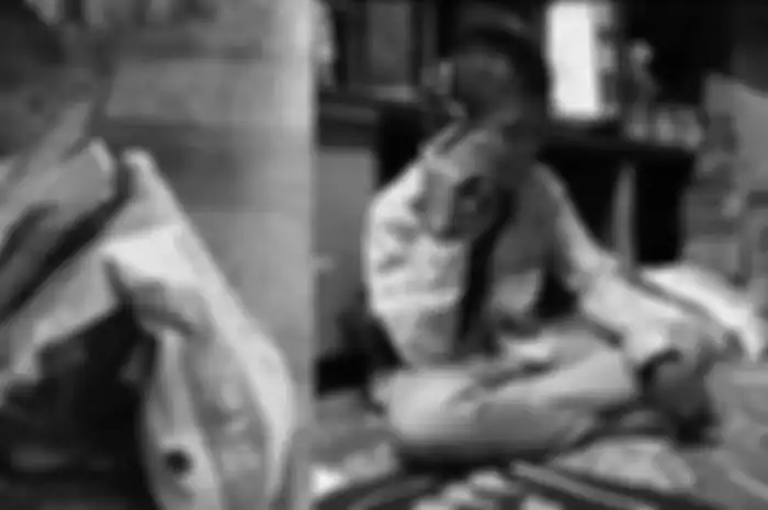 Akbar, remaja yang bekerja sebagai pemulung viral tengah membaca Al Quran 