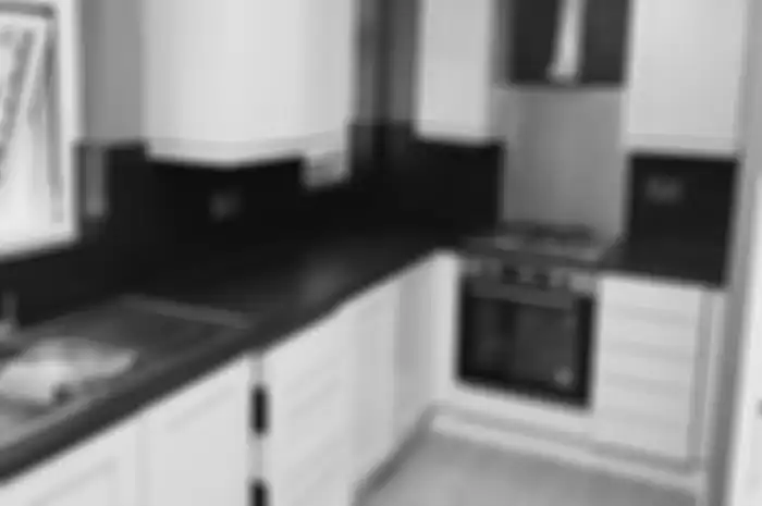 Foto desain dapur mungil yang sudah ketinggalan zaman. Jadi, hapus saja potretnya.