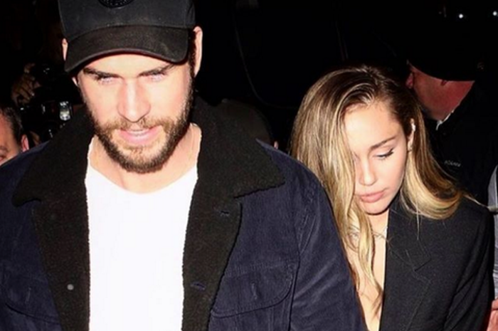 Miley Cyrus dan Liam Hemsworth resmi menikah.