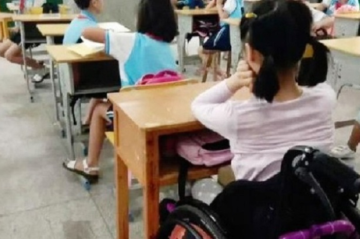 Seorang anak perempuan menderita cedera tulang belakang dan kelumpuhan tubuh bagian bawah setelah dia dipaksa melakukan push-up