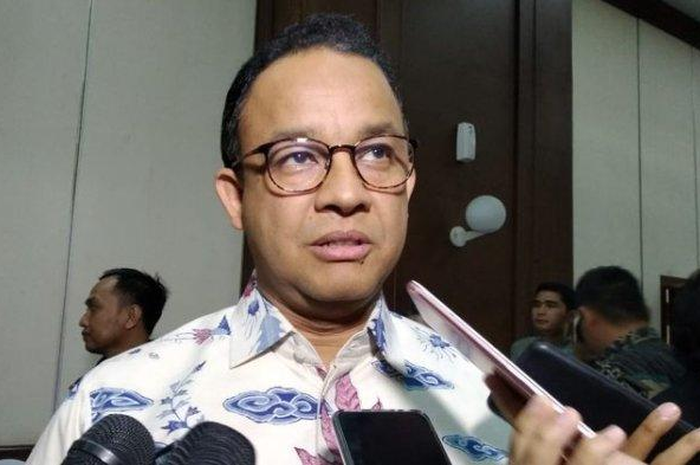 Anies Baswedan, usai mengikuti rapat soal persiapan pemindahan ibu kota baru di Kantor Bappenas, Jumat (15/11/2019). 
