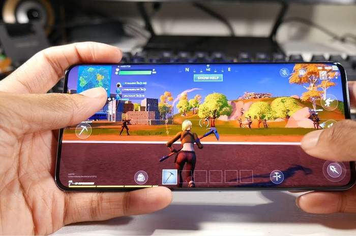 Ilustrasi main game di smartphone