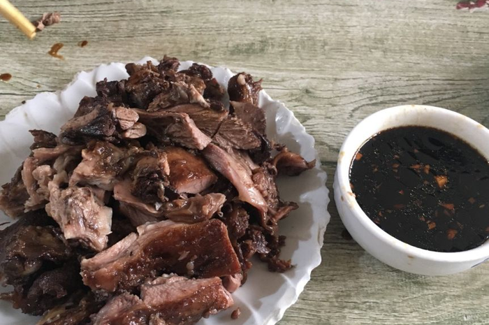 Ilustrasi Menu festival daging anjing di China 
