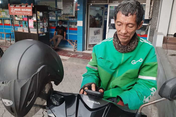 Dapat orderan fiktif dan tertipu sampai tabungannya terkuras, kini driver ojol di Semarang ini tersenyum lebar
