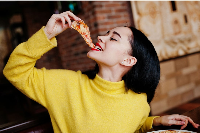 Makan pizza