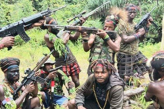 Ilustrasi KKB Papua. KKB Papua yang Berfoto dengan Jasad Korbannya Ternyata Adalah Anggota KNPB. 