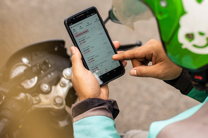 Ilustrasi driver Gojek.