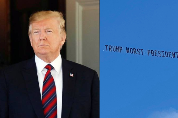 Pulang kampung, Donald Trump disambut spanduk 'Trump presiden terburuk yang pernah ada'