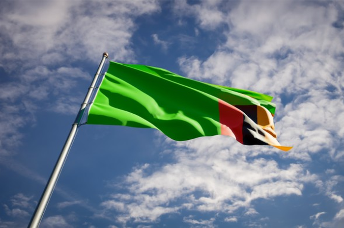 Bendera Zambia. (Ilustrasi) Punya Militer Paling Miskin di Dunia, Zambia Nyatanya Punya Kekayaan Tambang Melimpah, Tapi Bak Jadi Bumerang Bagi Perekonomiannya karena Hal Ini