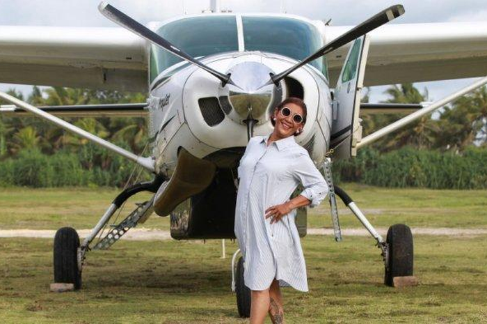 Mantan Menteri Kelautan dan Perikanan, Susi Pudjiastuti dengan Susi Air.