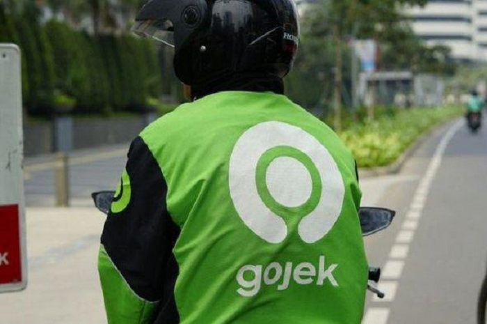 Ilustrasi tukang ojek online atau ojol Gojek
