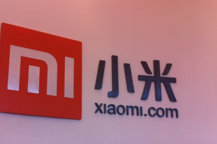 Ilustrasi logo dan tulisan Xiaomi
