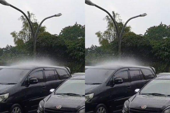 Viral hujan hanya guyur satu buah mobil di parkiran.