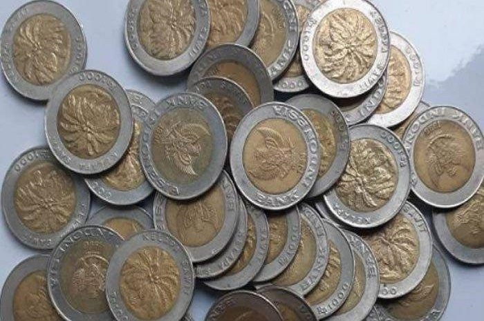 Ilustrasi uang koin seribu rupiah