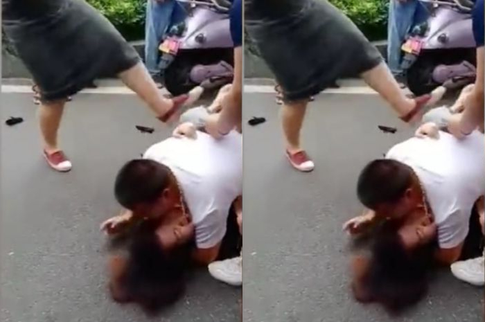 Wanita ditendang hingga ditelanjangi di depan banyak orang